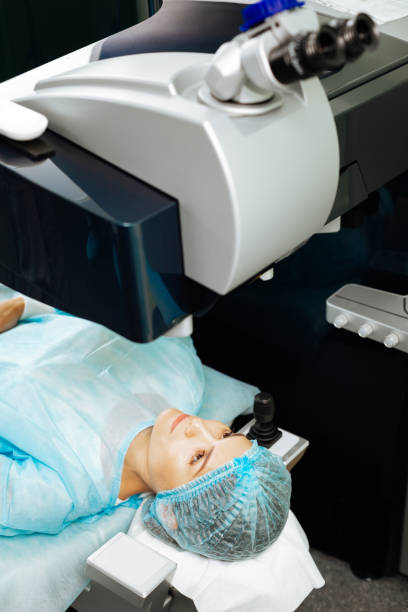 istock Nice female patient being prepared for eye treatment 1168897116