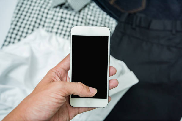 istock hand using mobile phone, Online Shopping Concept isolated white 1168898239