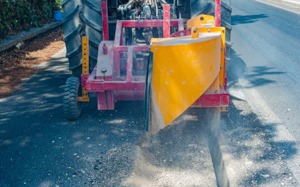 istock wreath with cones for drilling rock mounted on mini excavator during the execution of a mini-trench 1168900536