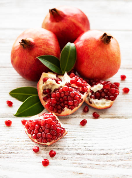 istock Ripe pomegranate fruits 1168901436