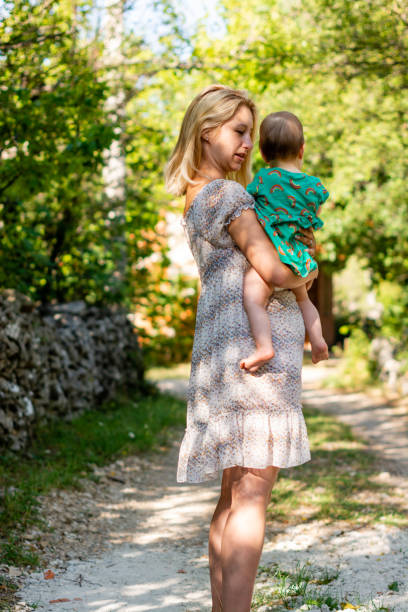 istock Mother and daughter walk in nature. 1168901733