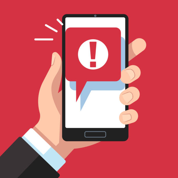 ilustrações de stock, clip art, desenhos animados e ícones de alert message mobile notification. hand holding smartphone with exclamation sign, virus notification on phone screen vector concept - text messaging e mail mobile phone symbol