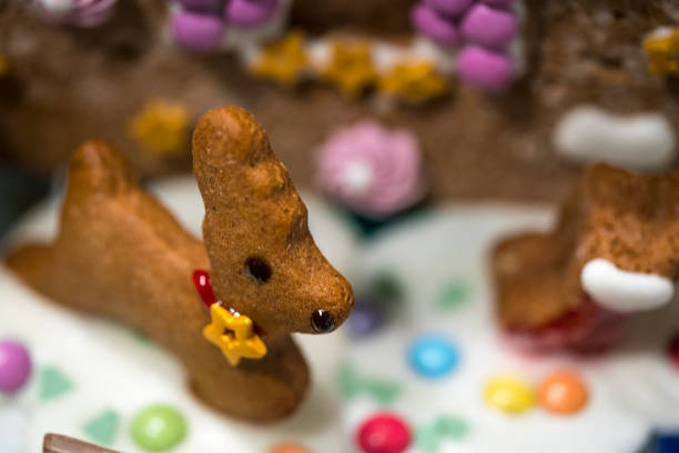 istock Homemade Gingerbread bambi in front House on snow 1168907164