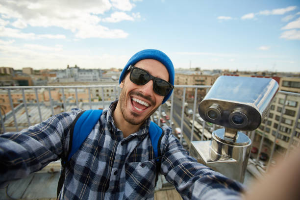 istock Excited Tourist on Rooftop 1168909392