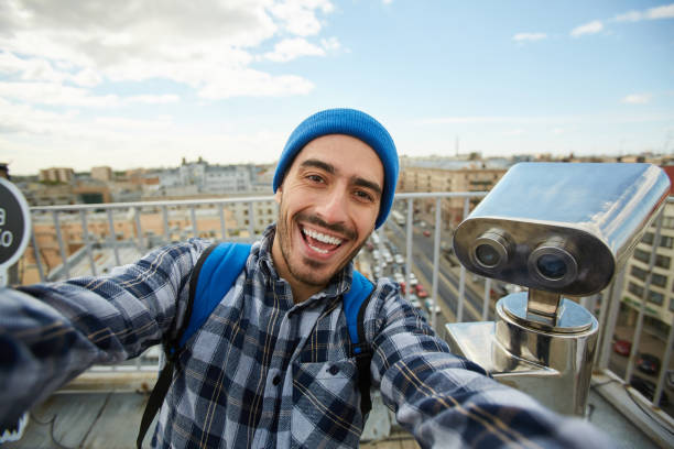 istock Tourist Taking Selfie on Rooftop 1168909398