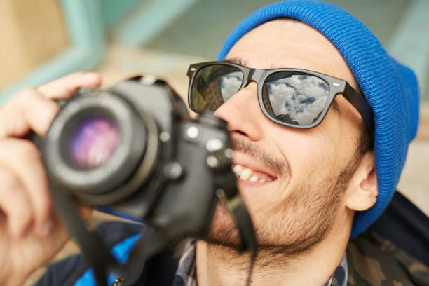 istock Tourist Taking Photos Closeup 1168909473