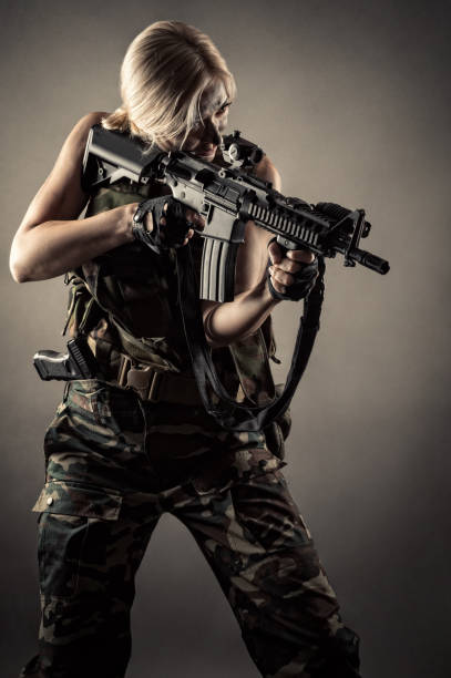 woman soldier with guns in hands