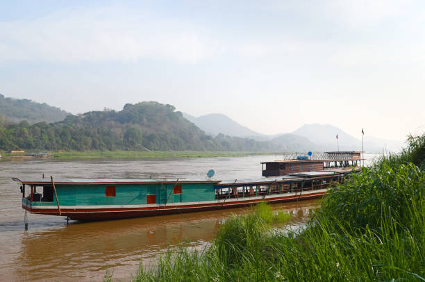 istock Long wooden boat on the Mekong river 1168911614