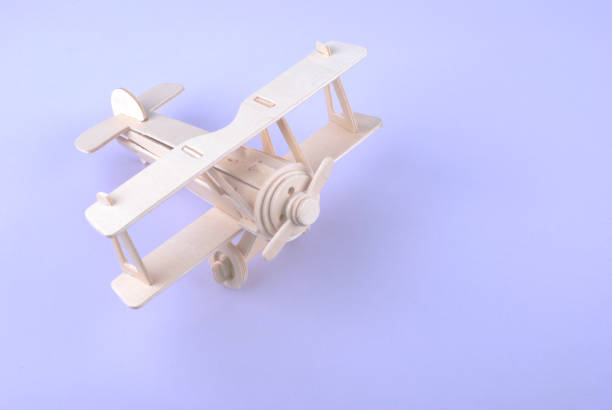 istock Wooden toy airplane on white background 1168912021