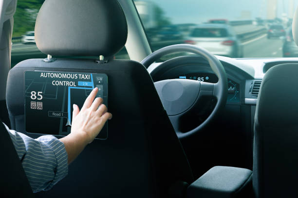 istock Passenger in autonomous taxi 1168912217