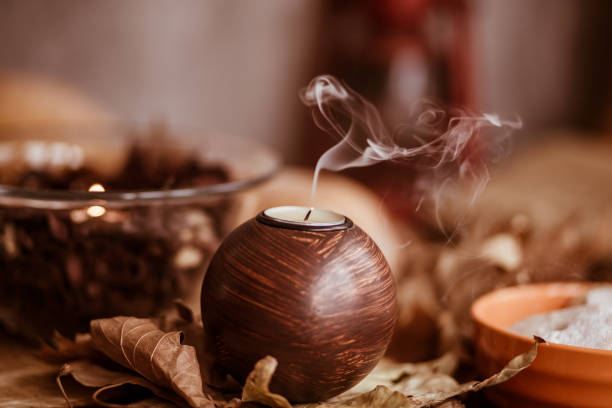 istock Wooden candle in fall arrangement 1168913715
