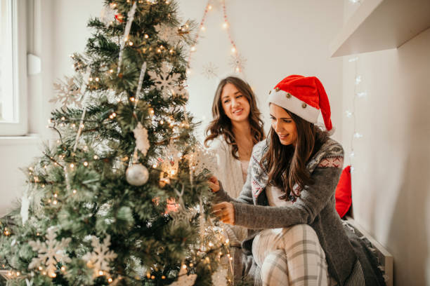 istock Two beautiful young women celebrating New Year 1168914557
