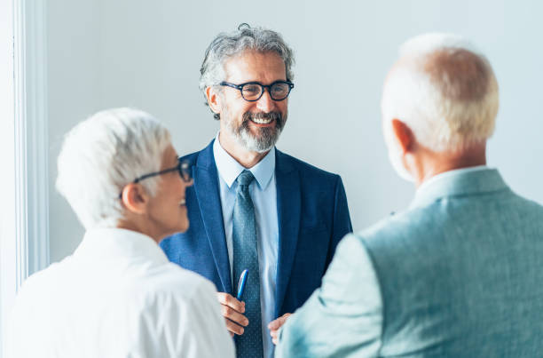 istock Happy business team in discussion 1168915225