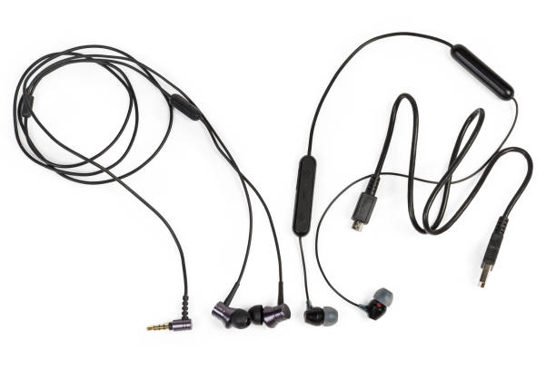 istock Wireless and wired earphones with cable on a white background 1168915836