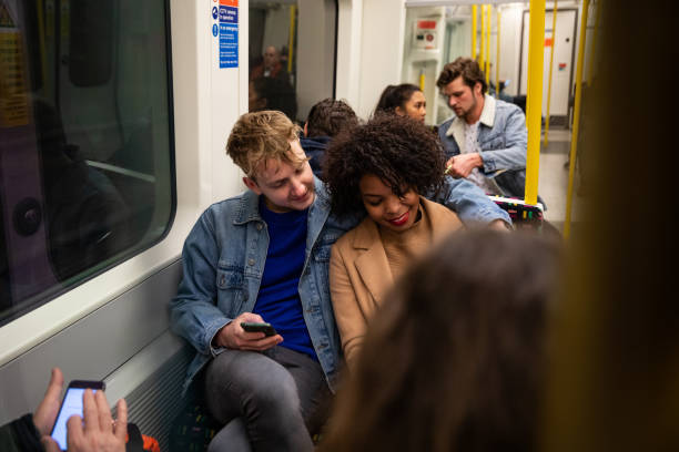 istock Group of friend in the subway train 1168916038