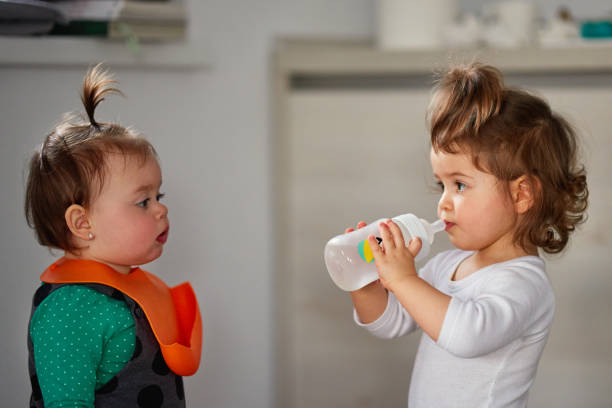 istock Cute little girls indoors 1168917246