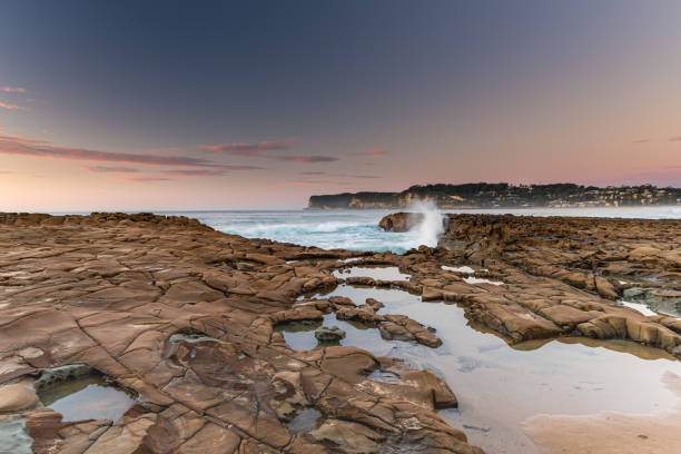istock Clear Skies and Rocky Coastal Sunrise 1168918211
