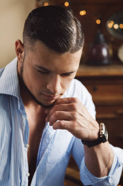 istock Handsome young man wearing blue shirt 1168918510