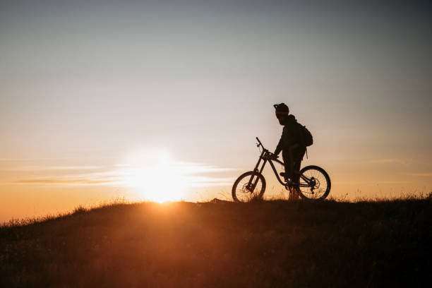 istock Downhill mountain biking in dawn 1168919817