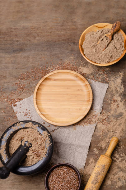 istock Flax flour with brown flax seeds 1168923088