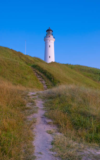 istock Hirtshals lighthouse at sunset on the coast of Denmark 1168925568