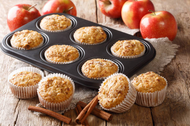 istock Vegetarian apple muffins with cinnamon close-up in a tray. horizontal 1168928052