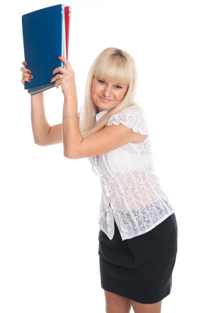 istock Cheerful young woman with business folders. 1168933367