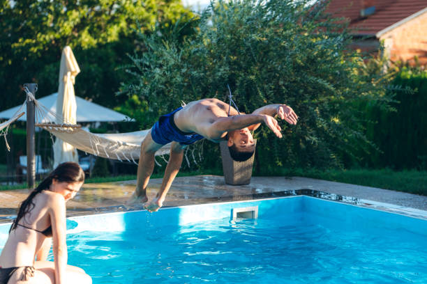 istock Showing off at swimming pool 1168935936