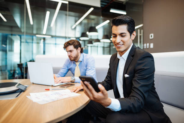 istock Engineers in Latin corporate company working together and using information technologies. 1168937645