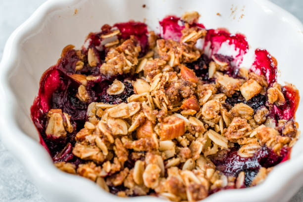 istock Crumble with Fresh Berries, Oatmeal, Nut, Flax Seeds and Granola. 1168937716