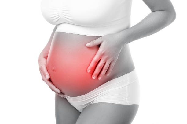Pregnant woman has pain in her stomach Pregnant woman has pain in her stomach. Concepts of different health problems during pregnancy. woman stealth stock pictures, royalty-free photos & images