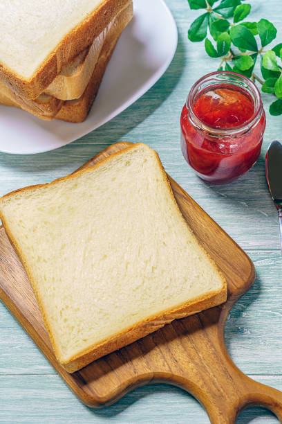 istock Sliced Toast Breadon on a Cutting Board 1168942815