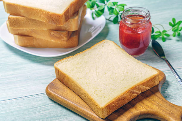 istock Sliced Toast Breadon on a Cutting Board 1168942818