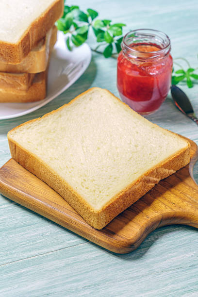 istock Sliced Toast Breadon on a Cutting Board 1168942859