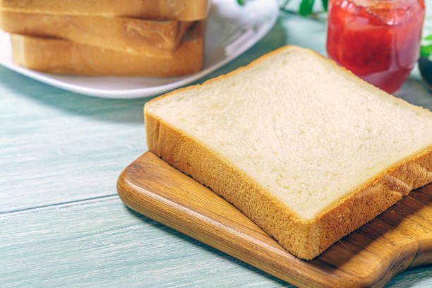 istock Sliced Toast Breadon on a Cutting Board 1168942880