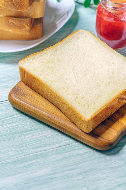 istock Sliced Toast Breadon on a Cutting Board 1168942891