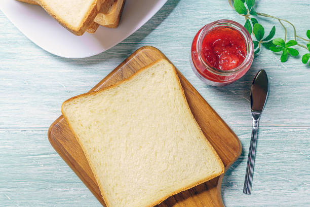 istock Sliced Toast Breadon on a Cutting Board 1168942914