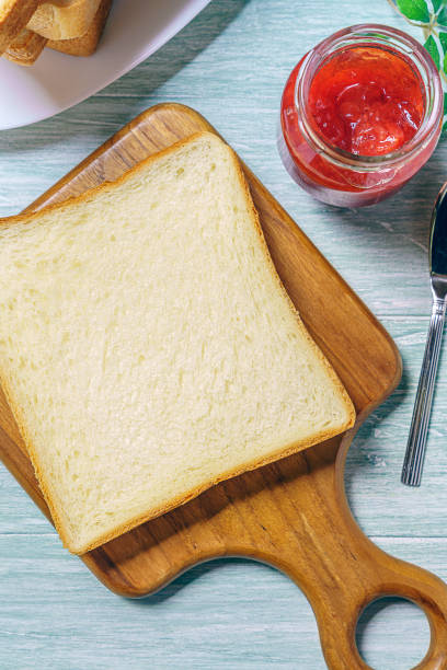 istock Sliced Toast Breadon on a Cutting Board 1168942929