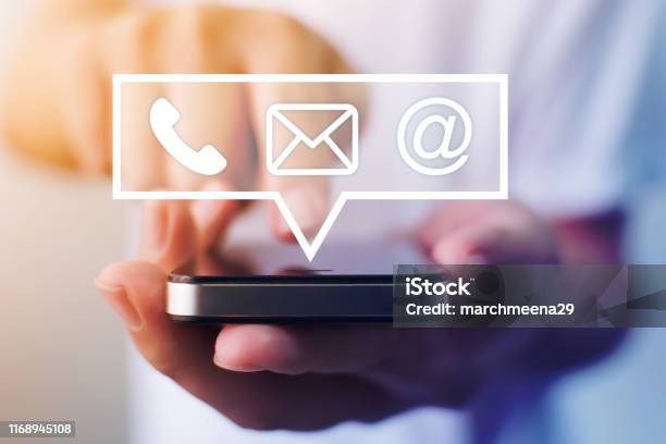 Closeup Image Of Male Hands Using Smartphone With Icon Telephone Email Mobile Phone And Address Contact Us Connection And Email Marketing Concept Stock Photo - Download Image Now