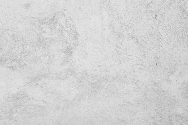 istock Loft-style plaster walls, gray, white, empty space used as wallpaper. Popular in home design or interior design. with copy spaces. 1168945247