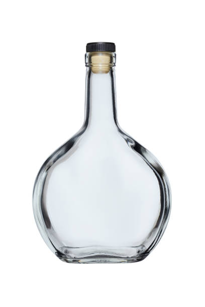 istock Empty glass bottle of rounded shape closed with a cork, isolated on a white background 1168947613
