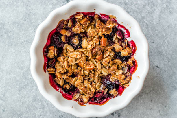istock Crumble with Fresh Berries, Oatmeal, Nut, Flax Seeds and Granola. 1168949244