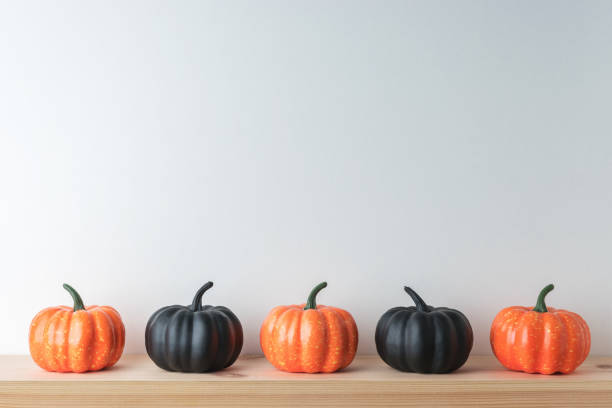 istock Halloween pumpkin decor on white background. Creative Halloween minimal concept. 1168952256