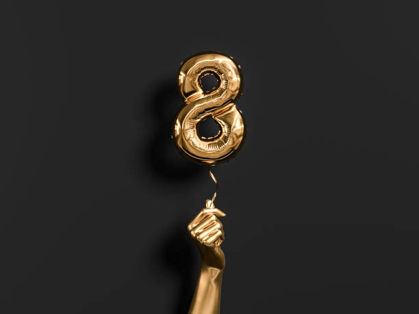 istock Golden hand holding Number 8 foil balloon. 1168953564