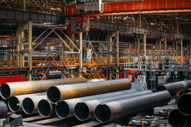 istock Black steel pipes in warehouse 1168955447