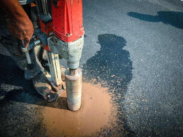 istock Inspection of asphalt road. 1168957437