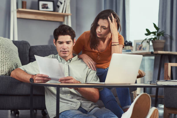 istock I hope we're not sinking into debt 1168957554