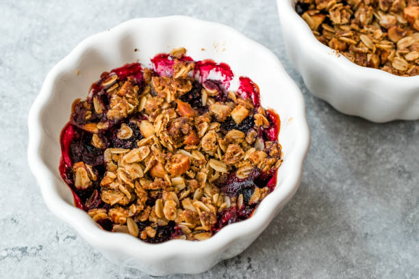 istock Crumble with Fresh Berries, Oatmeal, Nut, Flax Seeds and Granola. 1168957793