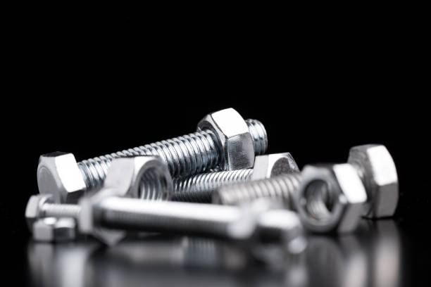 istock Steel nuts and bolts close-up. 1168962745