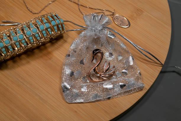 istock wooden tray on a gray background with trinkets 1168963262